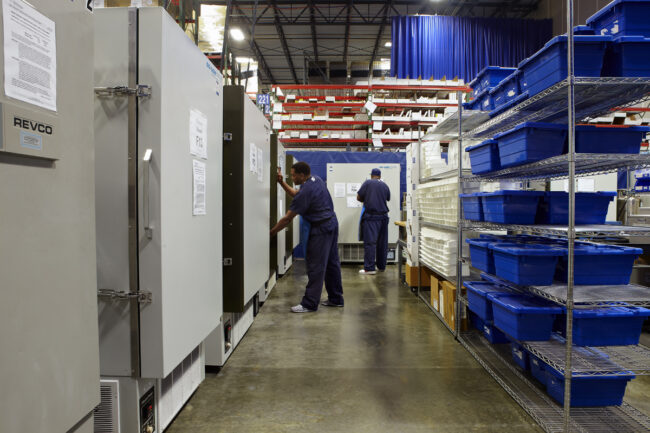 image of two people working in a logistics warehouse