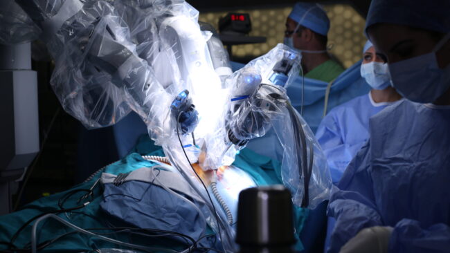 image of a robotic-assisted surgery being performed