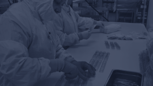 Millstone’s cleanroom team executing medical device packaging for regulatory compliance.