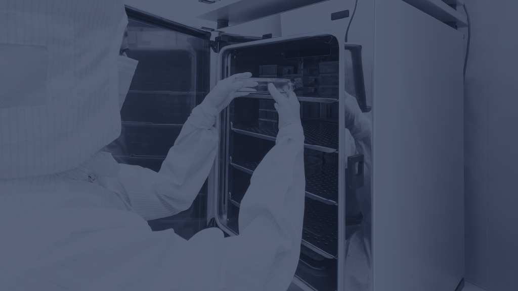 Technician conducting sterile barrier integrity testing on medical device packaging to ensure medical device shelf life validation and long-term performance.